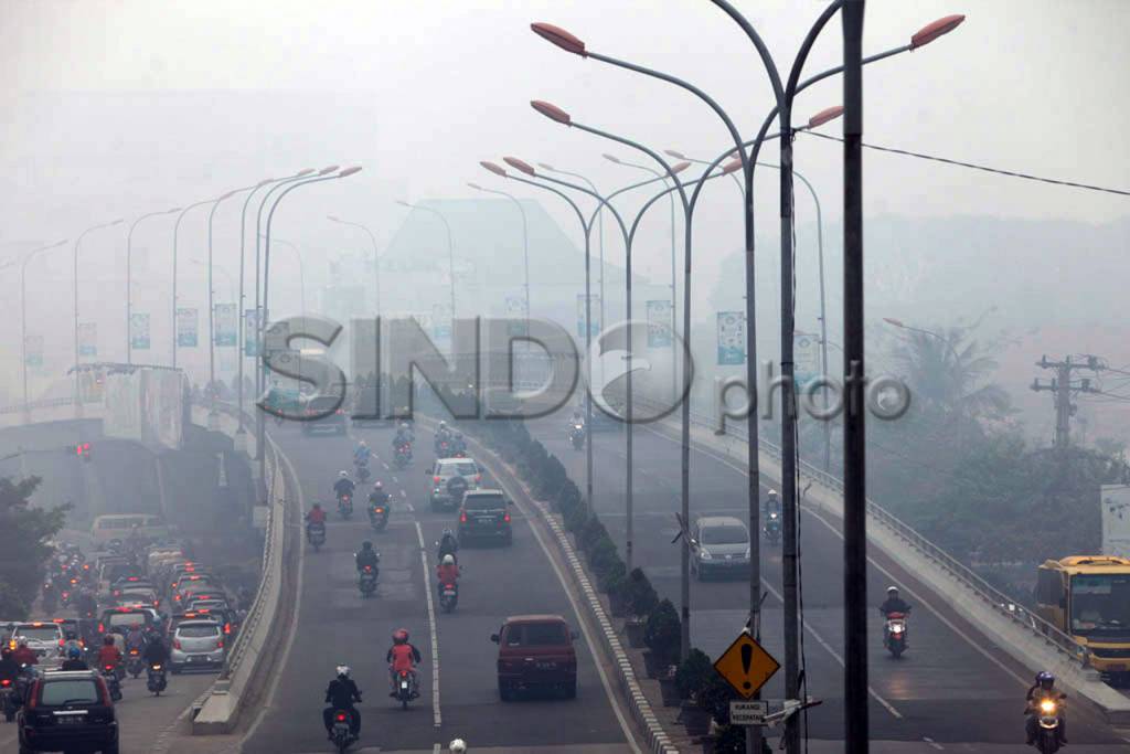 Palembang Diselimuti...