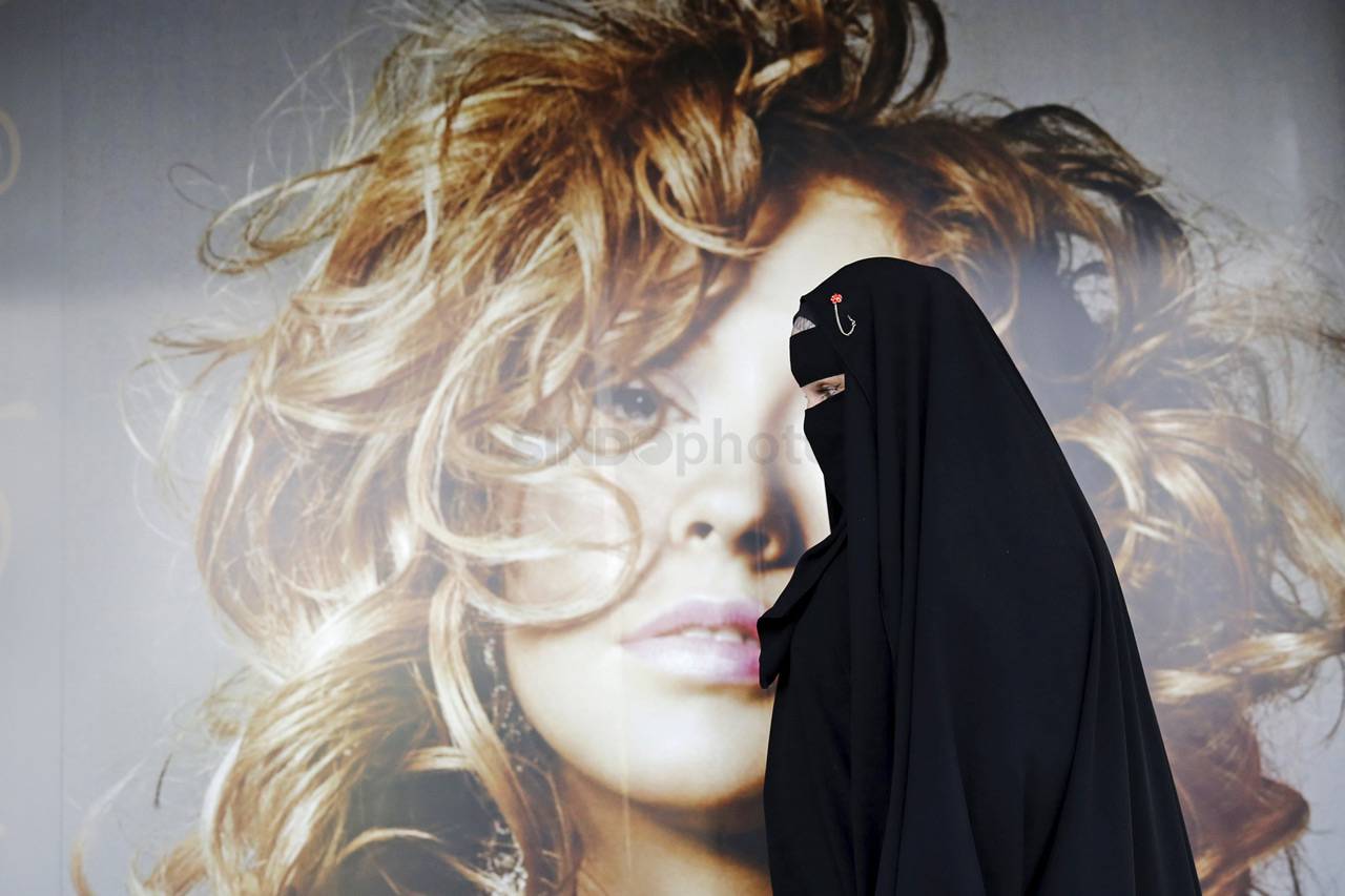 Muslimah Bercadar Ini,...