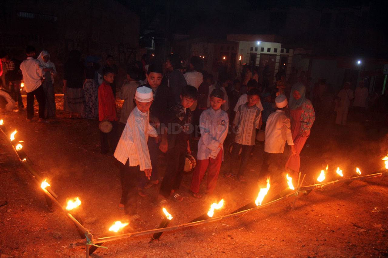 Pawai Obor Sambut Tahun...