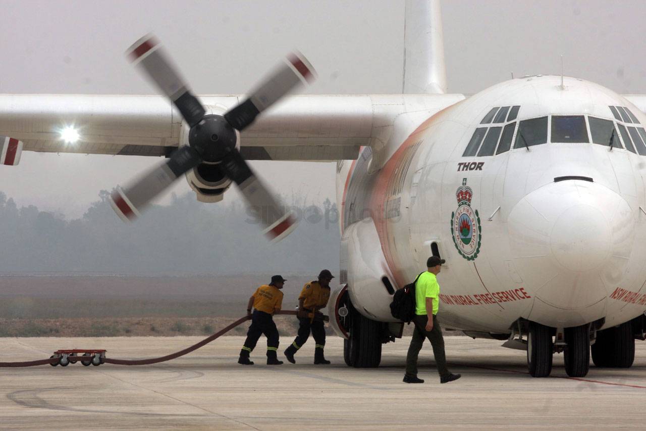 Pesawat Lockheed L100-30...
