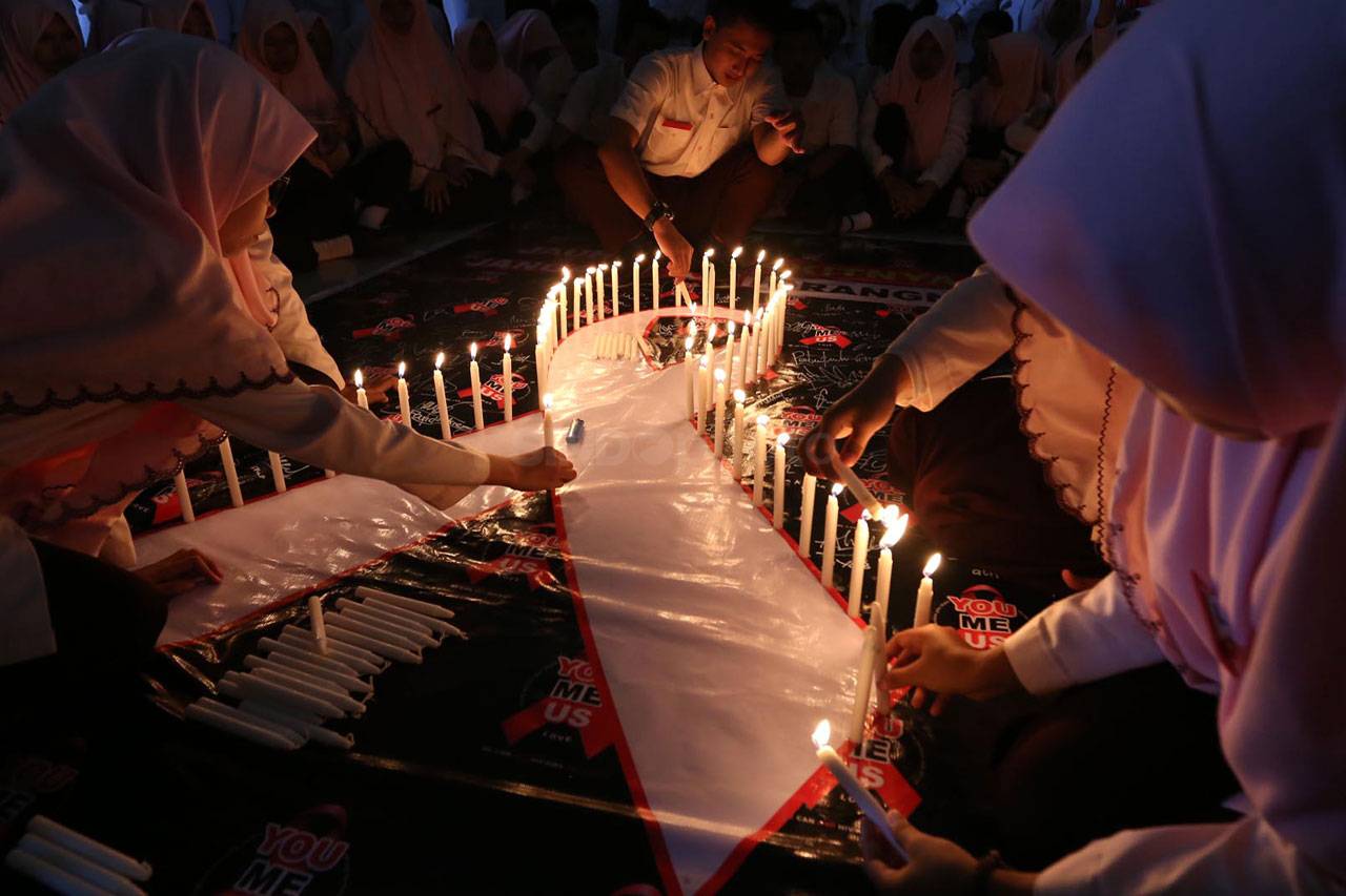 Lilin Solidaritas Untuk...