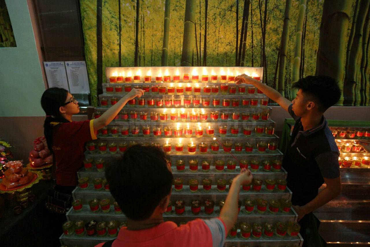 Umat Tri Dharma Sambut...