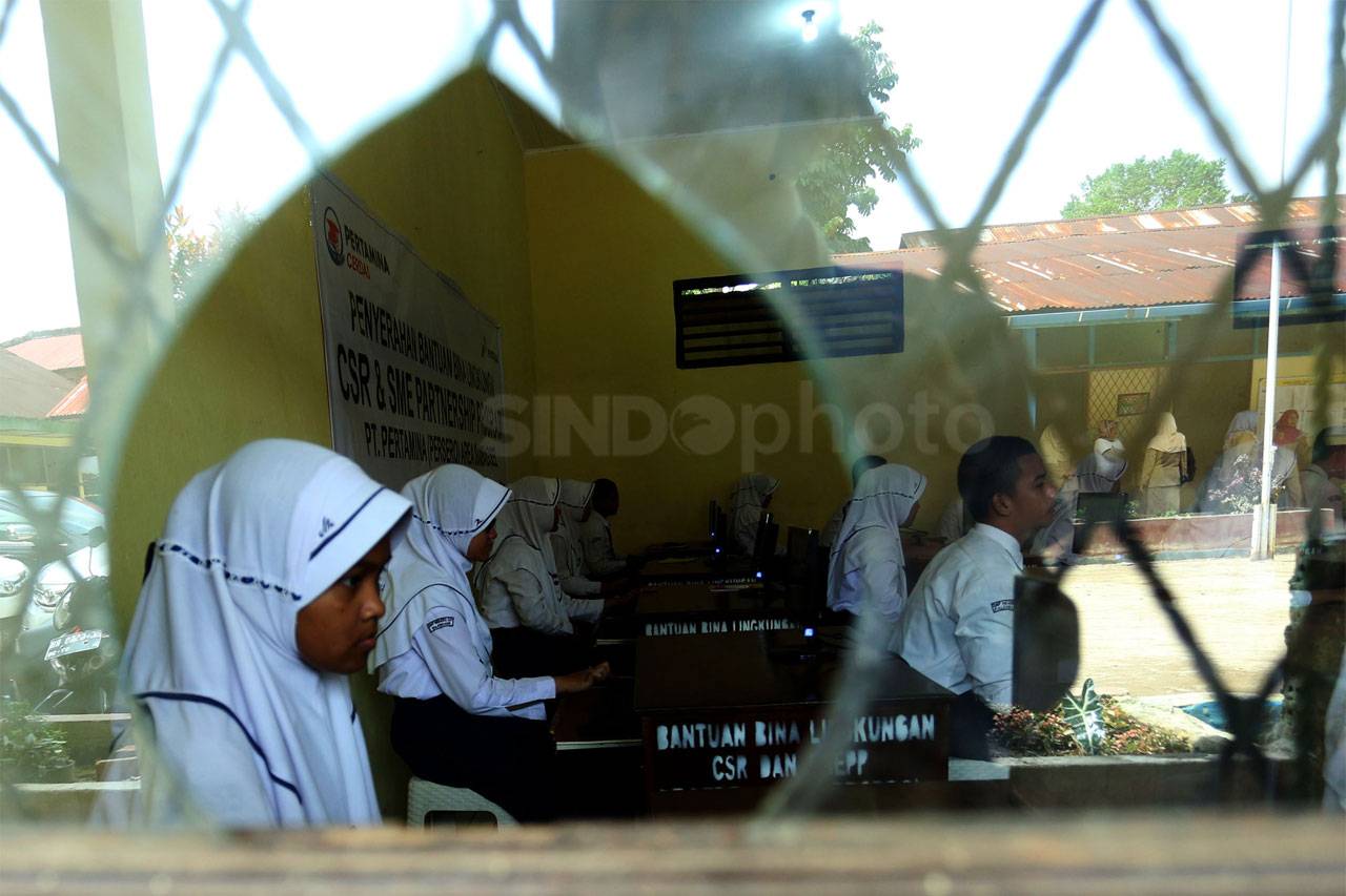 Pertamina Serahkan Bantuan...