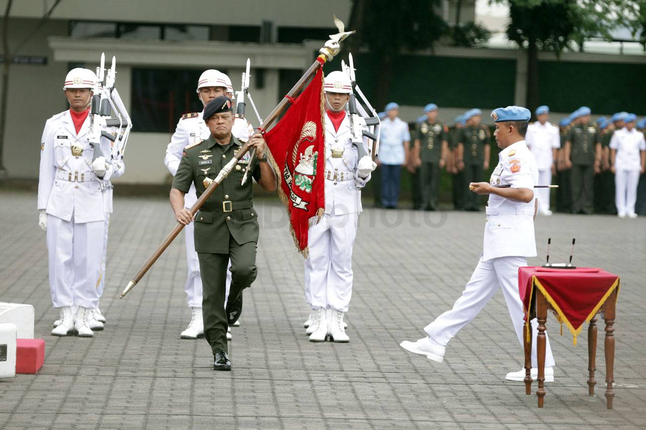 Brigjen TNI (Mar) Suhartono...
