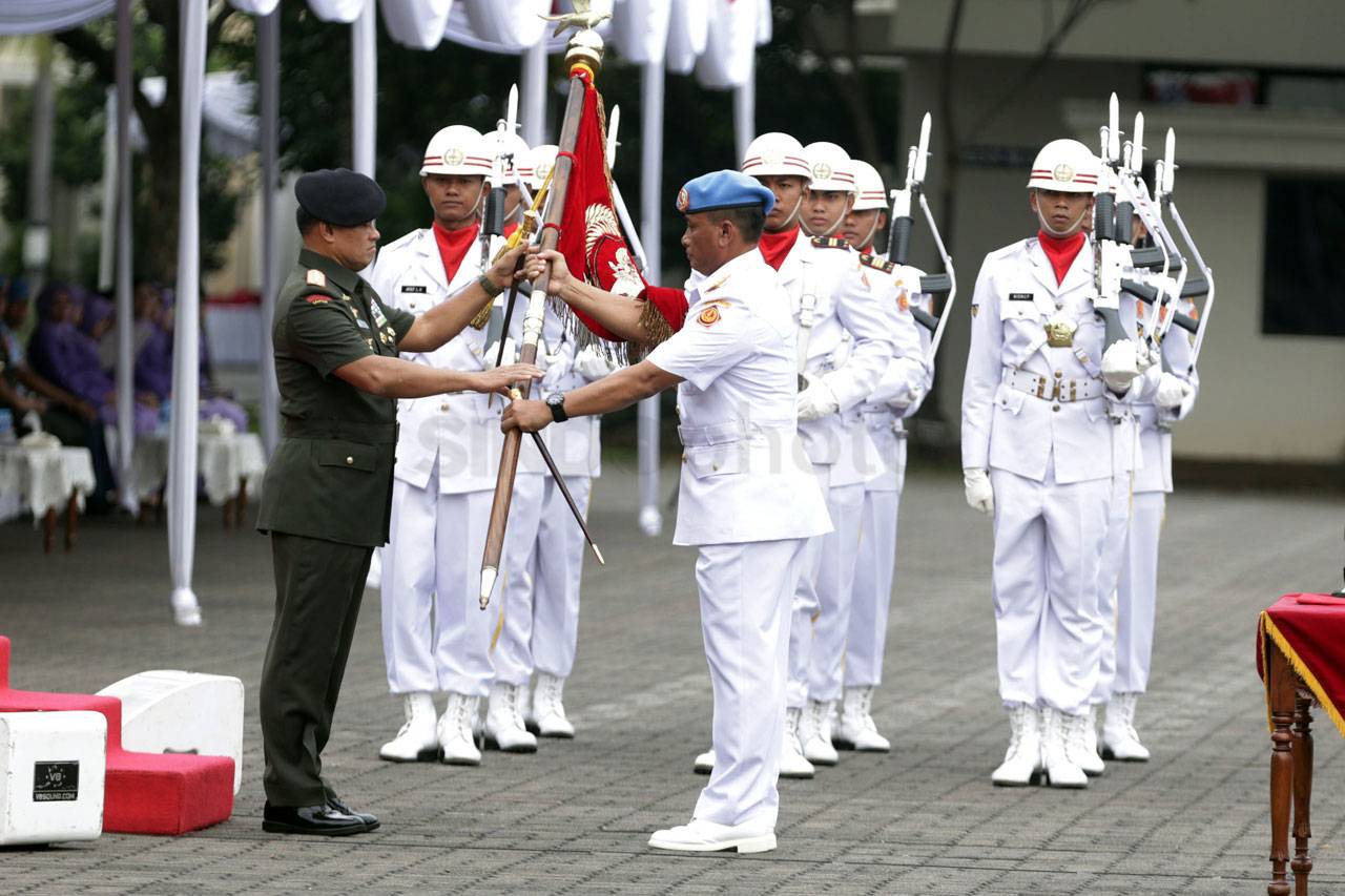 Brigjen TNI (Mar) Suhartono...