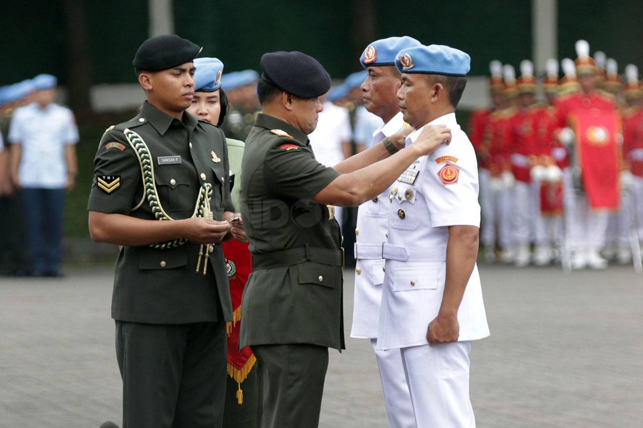 Brigjen TNI (Mar) Suhartono...
