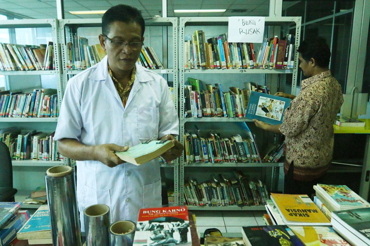 Konservasi Buku di Perpustakaan...