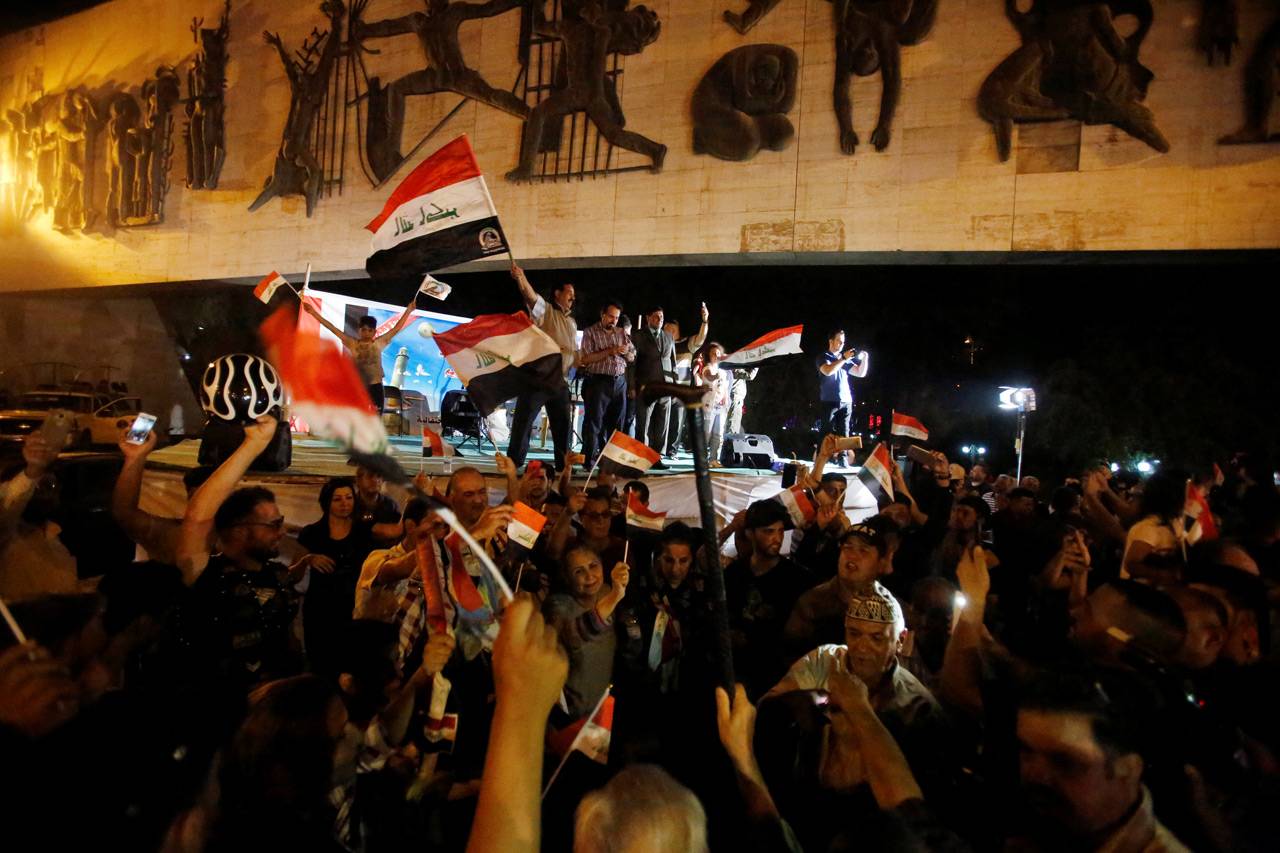 Warga Irak Rayakan Kemenangan...