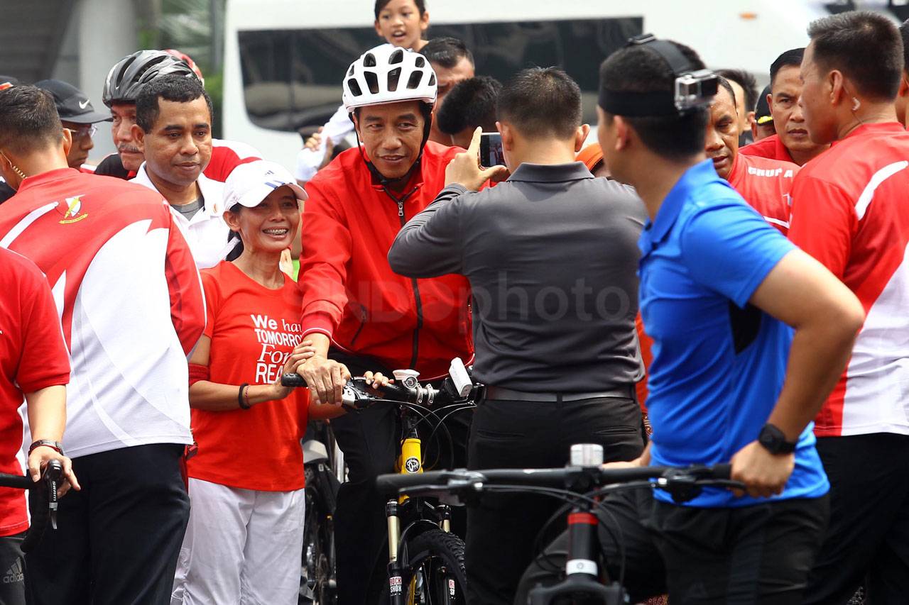 Presiden Jokowi dan...