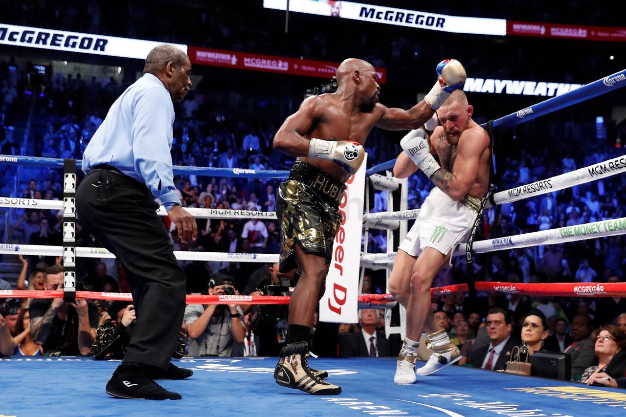 Mayweather Menang TKO...
