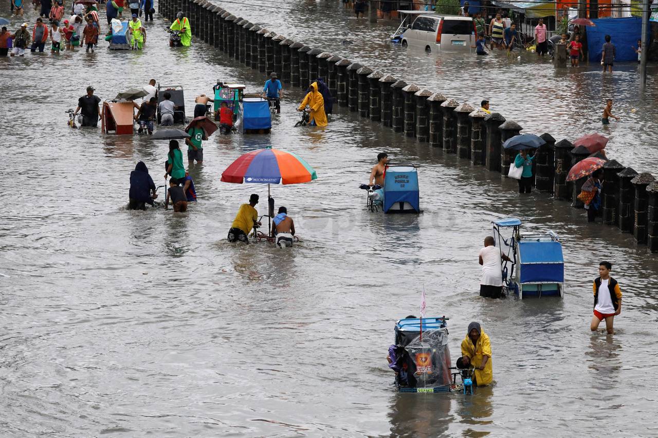 Angin Topan dan Banjir...