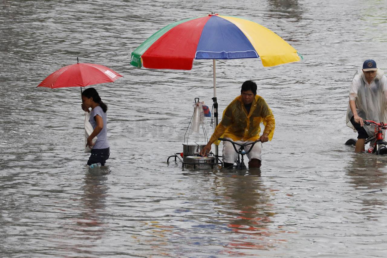 Angin Topan dan Banjir...