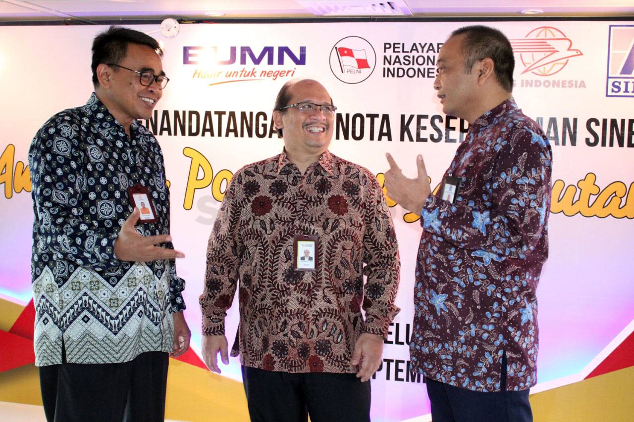 PT Pos Indonesia dan...