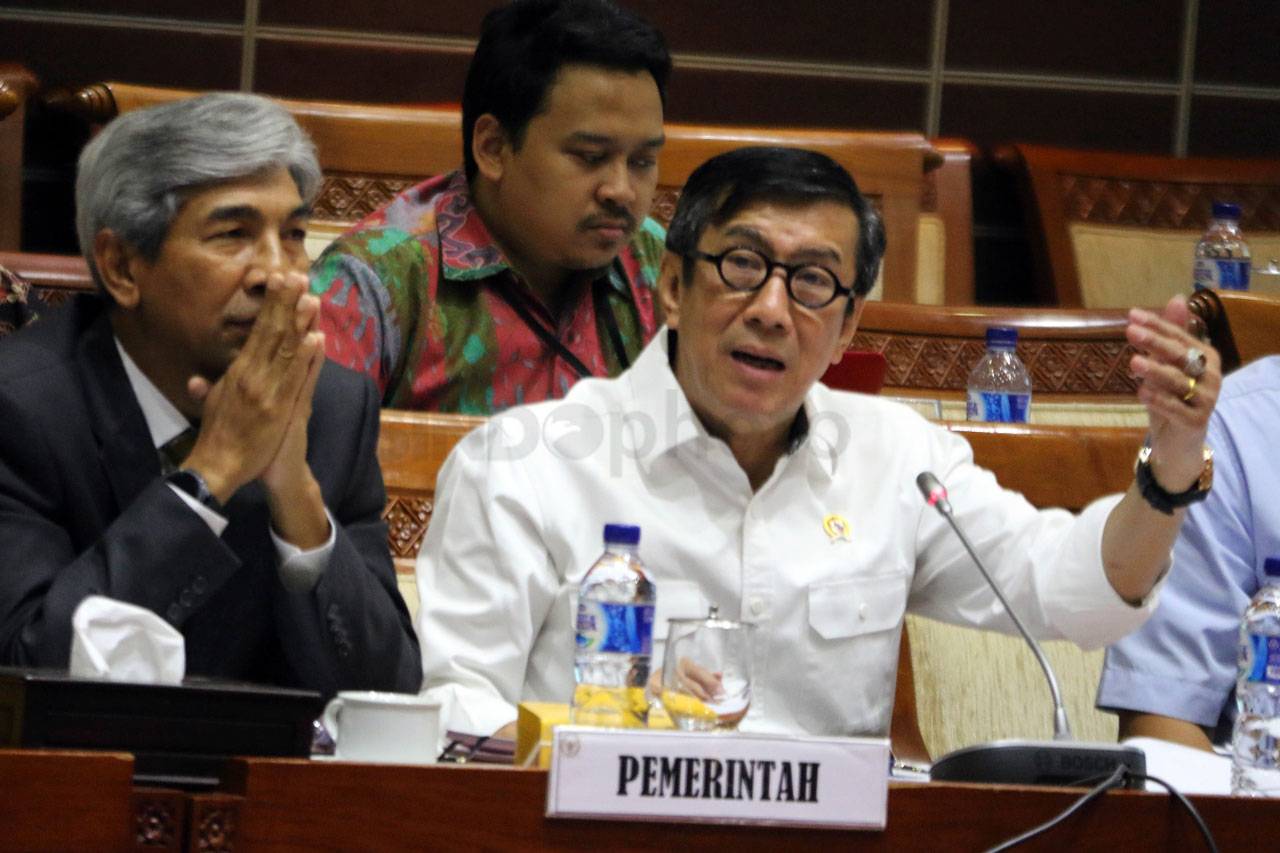 Menkumham dan Komisi...
