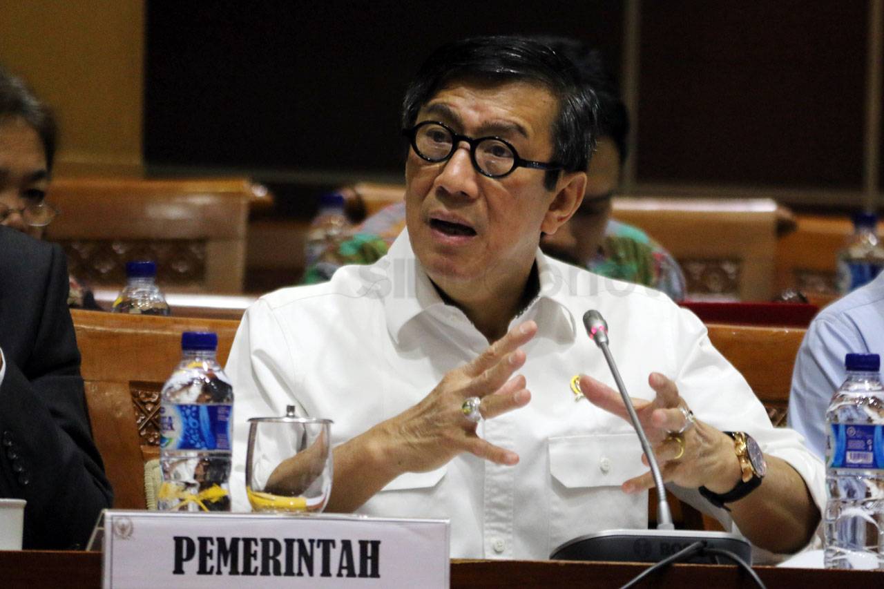 Menkumham dan Komisi...
