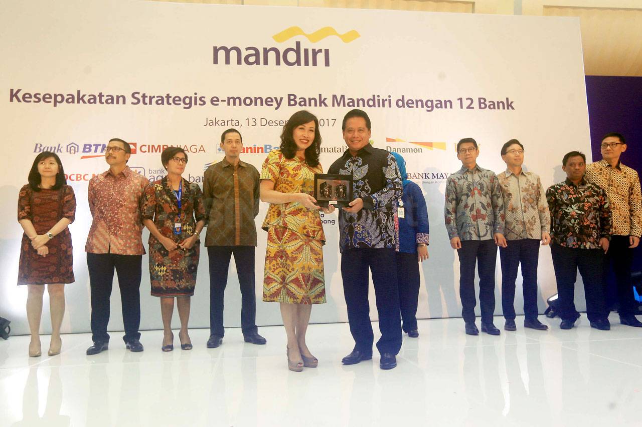 Sinergi dengan 12 Bank,...