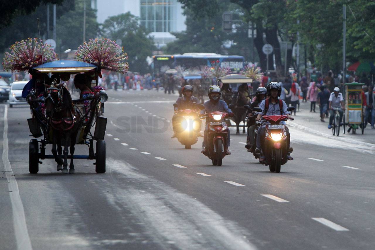 Menikmati Jakarta Lengang...