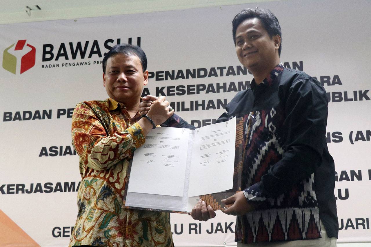 Bawaslu Kerja Sama dengan...