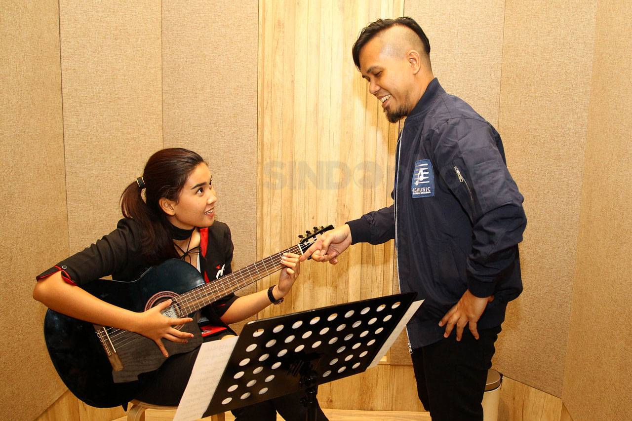 Musisi Erwin Gutawa...