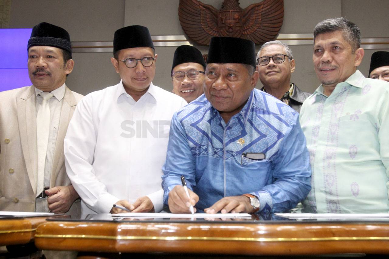 Pemerintah dan DPR Tetapkan...