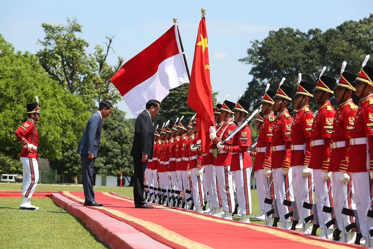 Presiden Jokowi Sambut...
