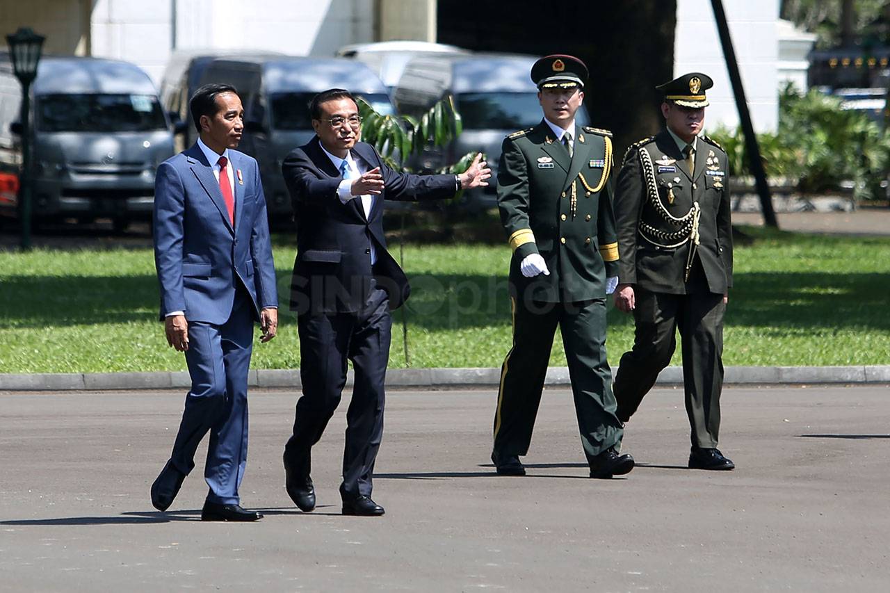 Presiden Jokowi Sambut...