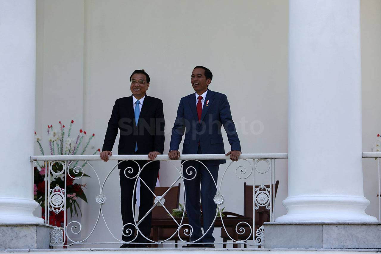 Presiden Jokowi Sambut...