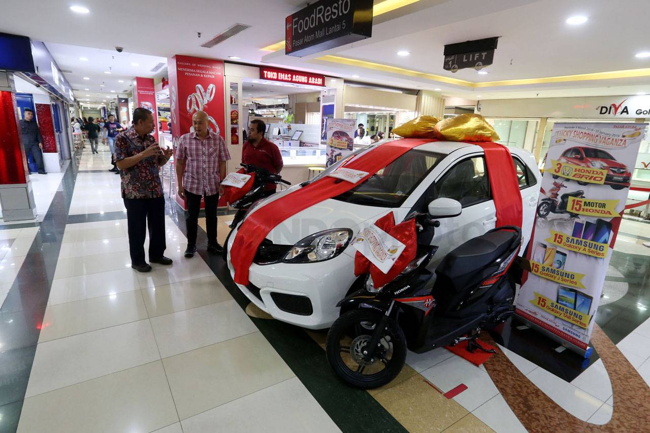 Pasar Atom Gandeng Tri...