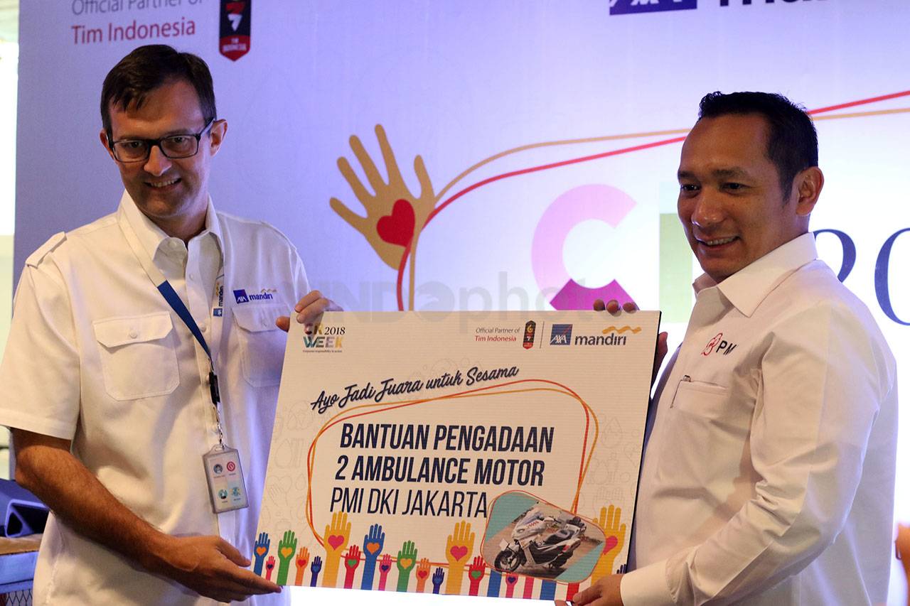 AXA Mandiri Donasi Dua...