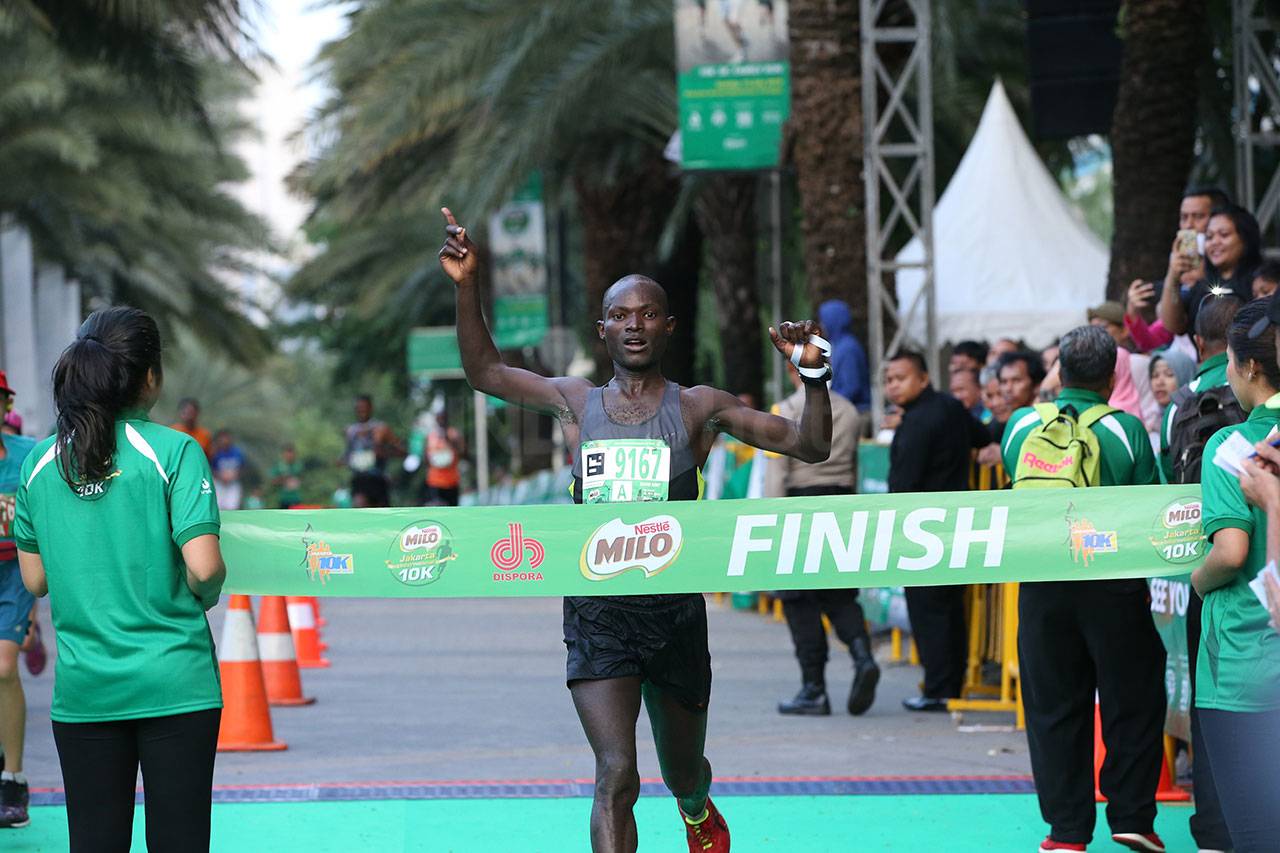 Pelari Kenya David Kibet...