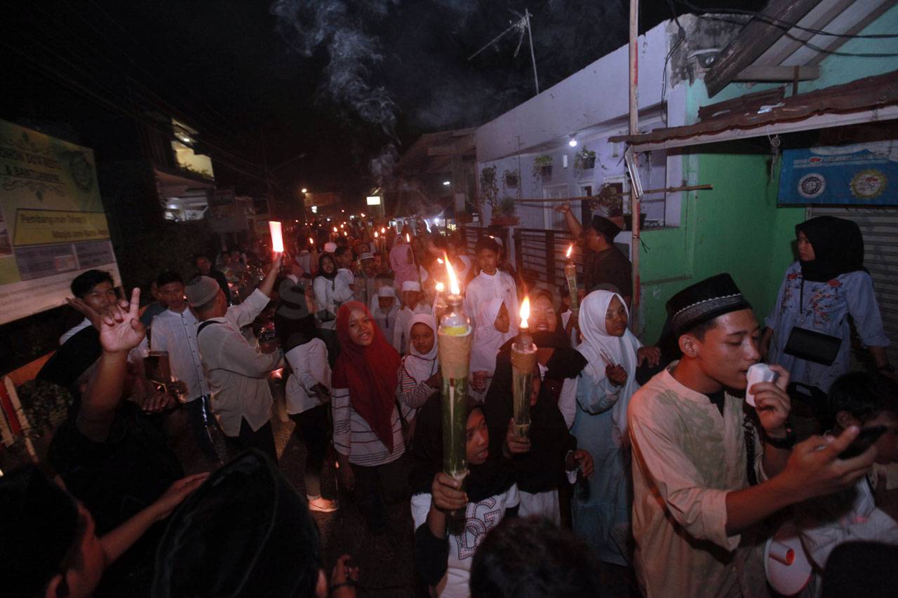 Pawai Obor Sambut Tahun...