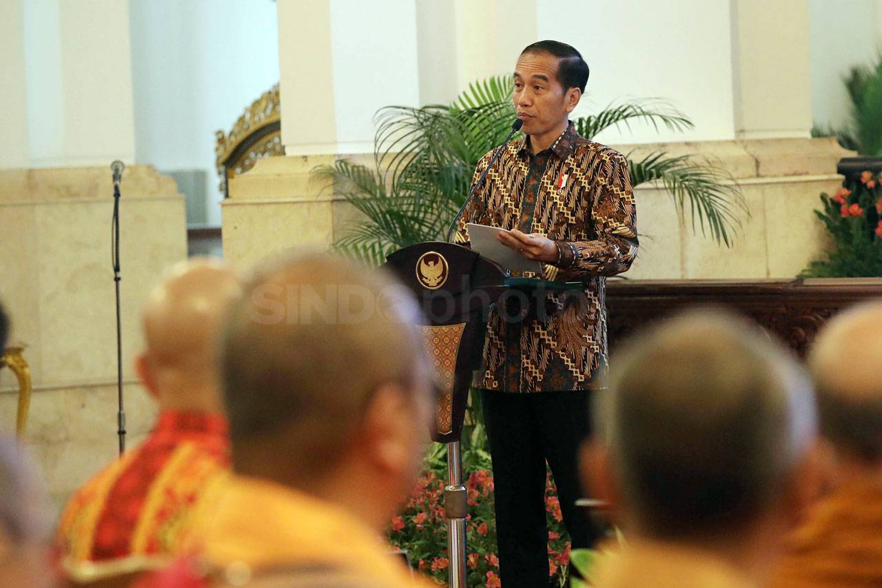 Presiden Jokowi Membuka...