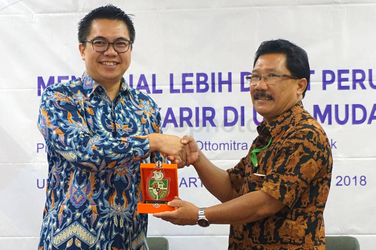 WOM Finance Gelar Seminar...
