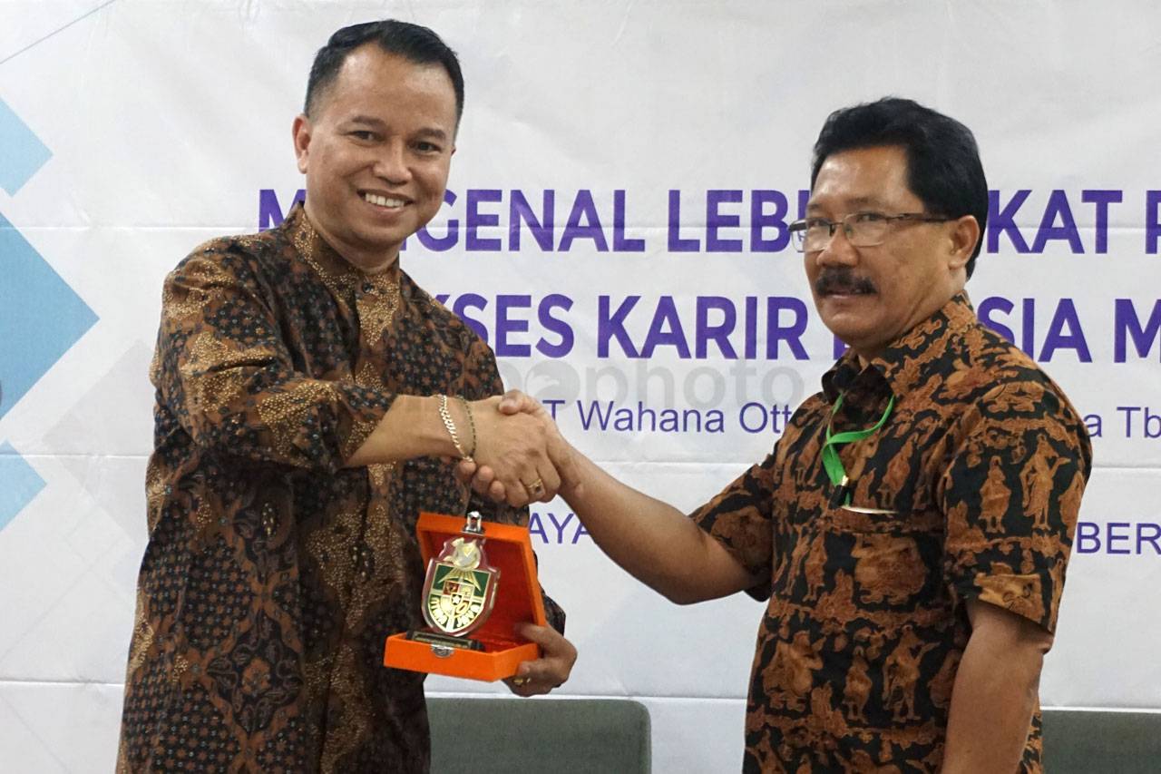 WOM Finance Gelar Seminar...