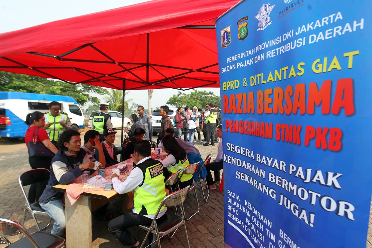 Kejar Target Pajak,...
