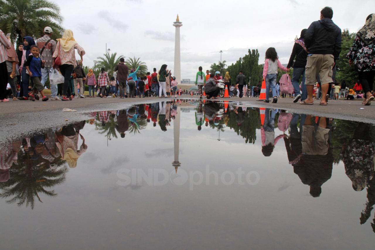 Libur Tahun Baru, Warga...