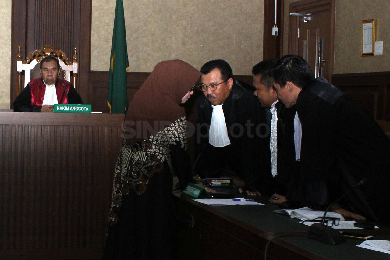 Eni Maulani Saragih...