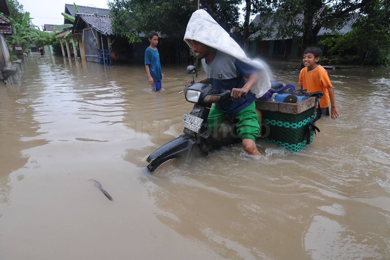 Curah Hujan Tinggi,...