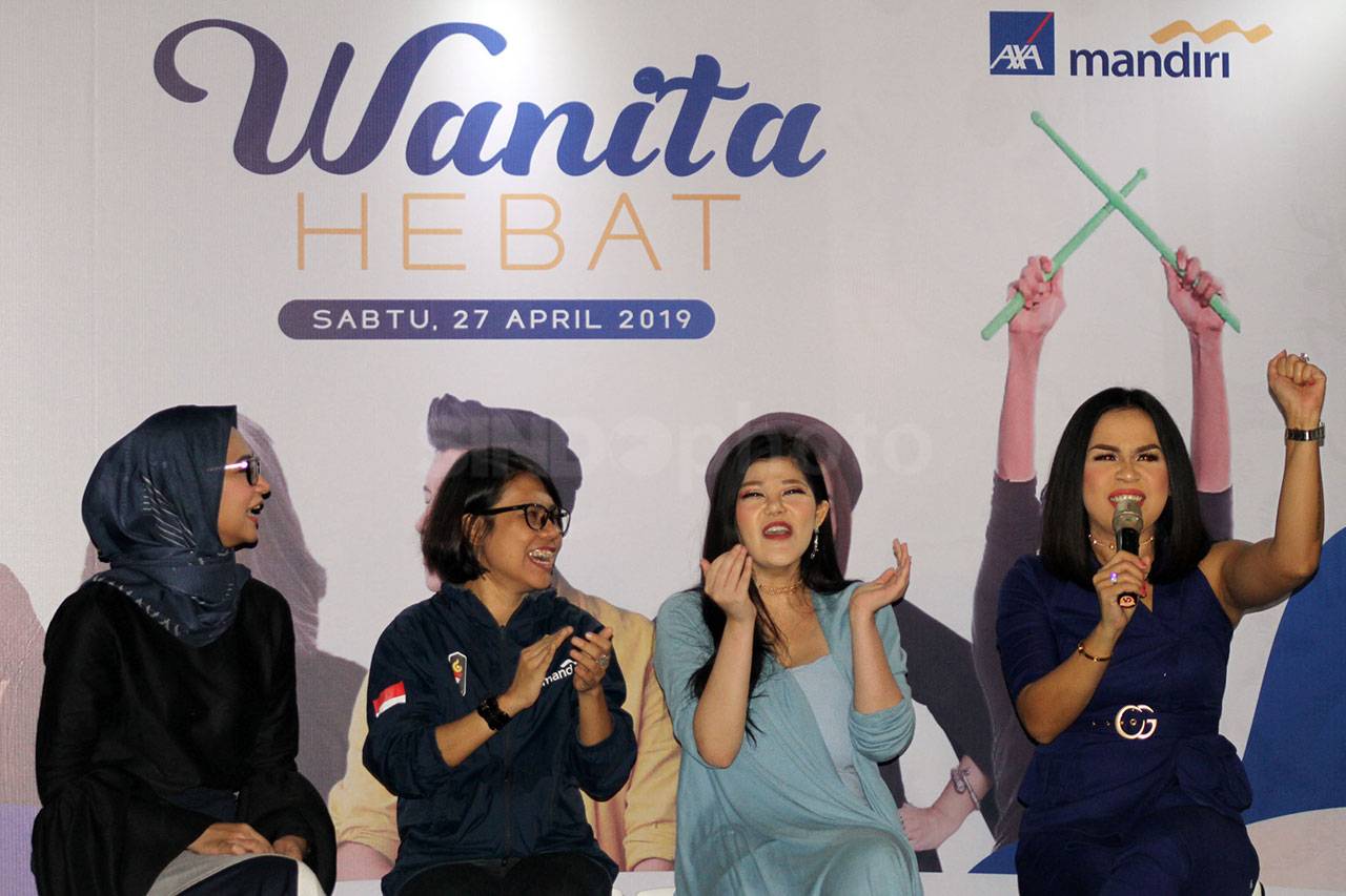AXA Mandiri Gelar Program...