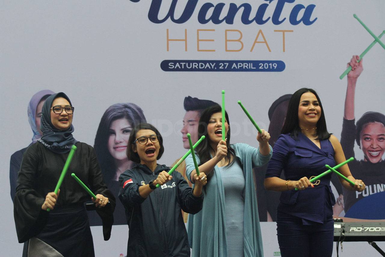 AXA Mandiri Gelar Program...