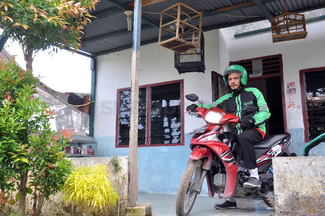 Pengemudi Ojol Erwin...
