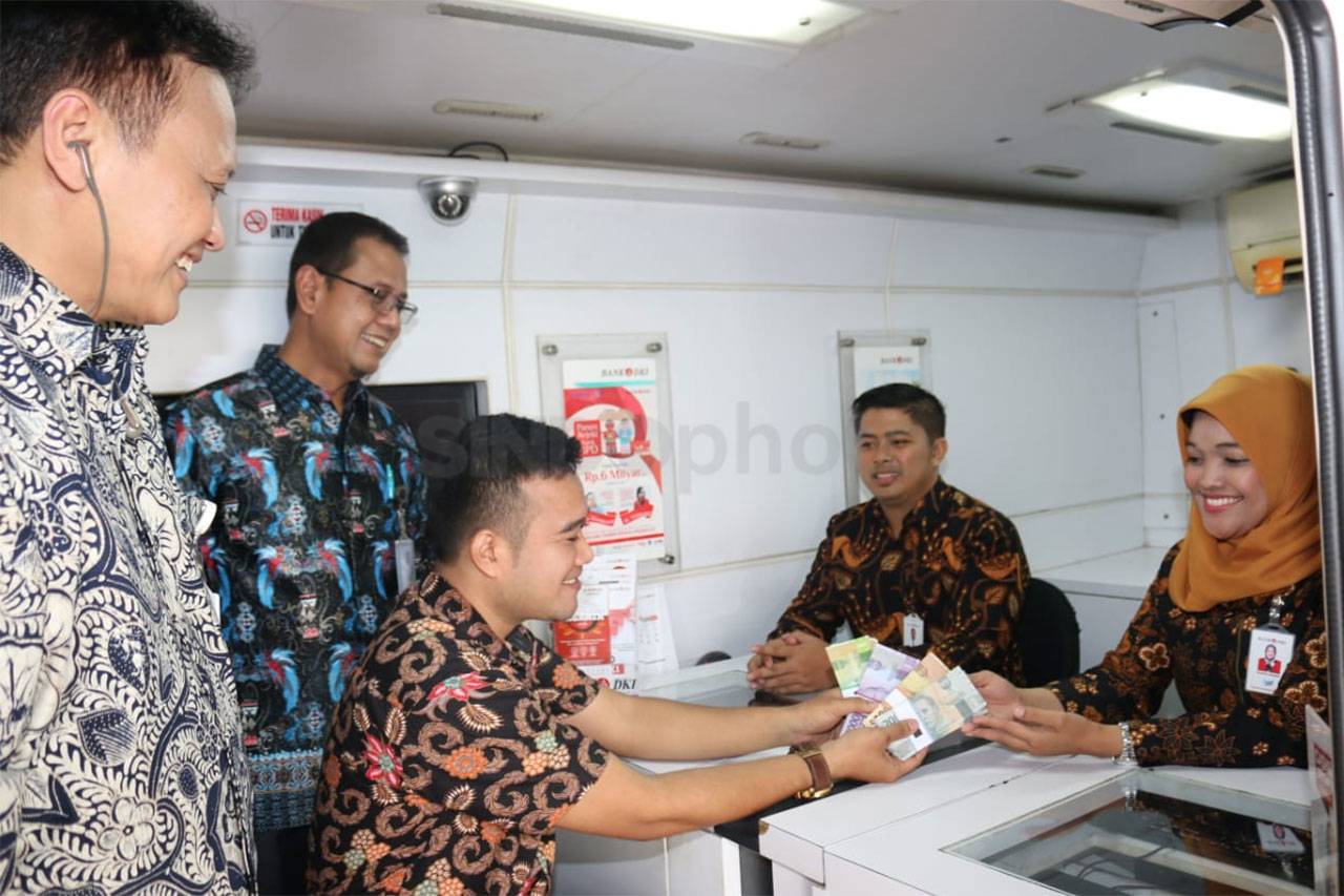 Layanan Tukar Uang Pecahan...