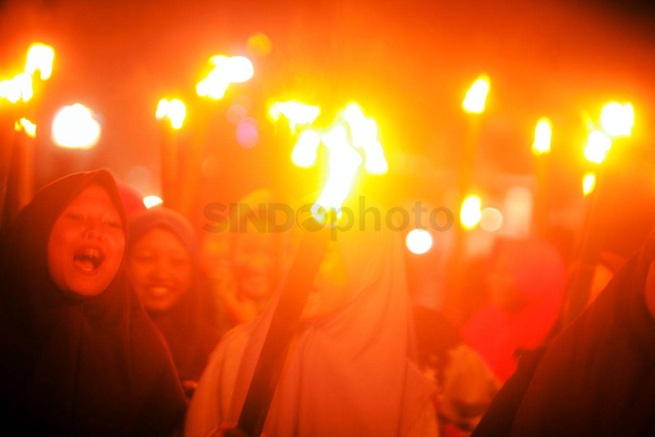 Pawai Obor Sambut Hari...