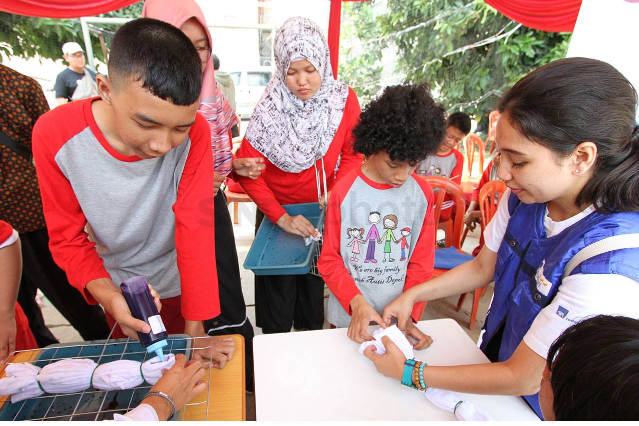 AXA Mandiri Gelar CR...