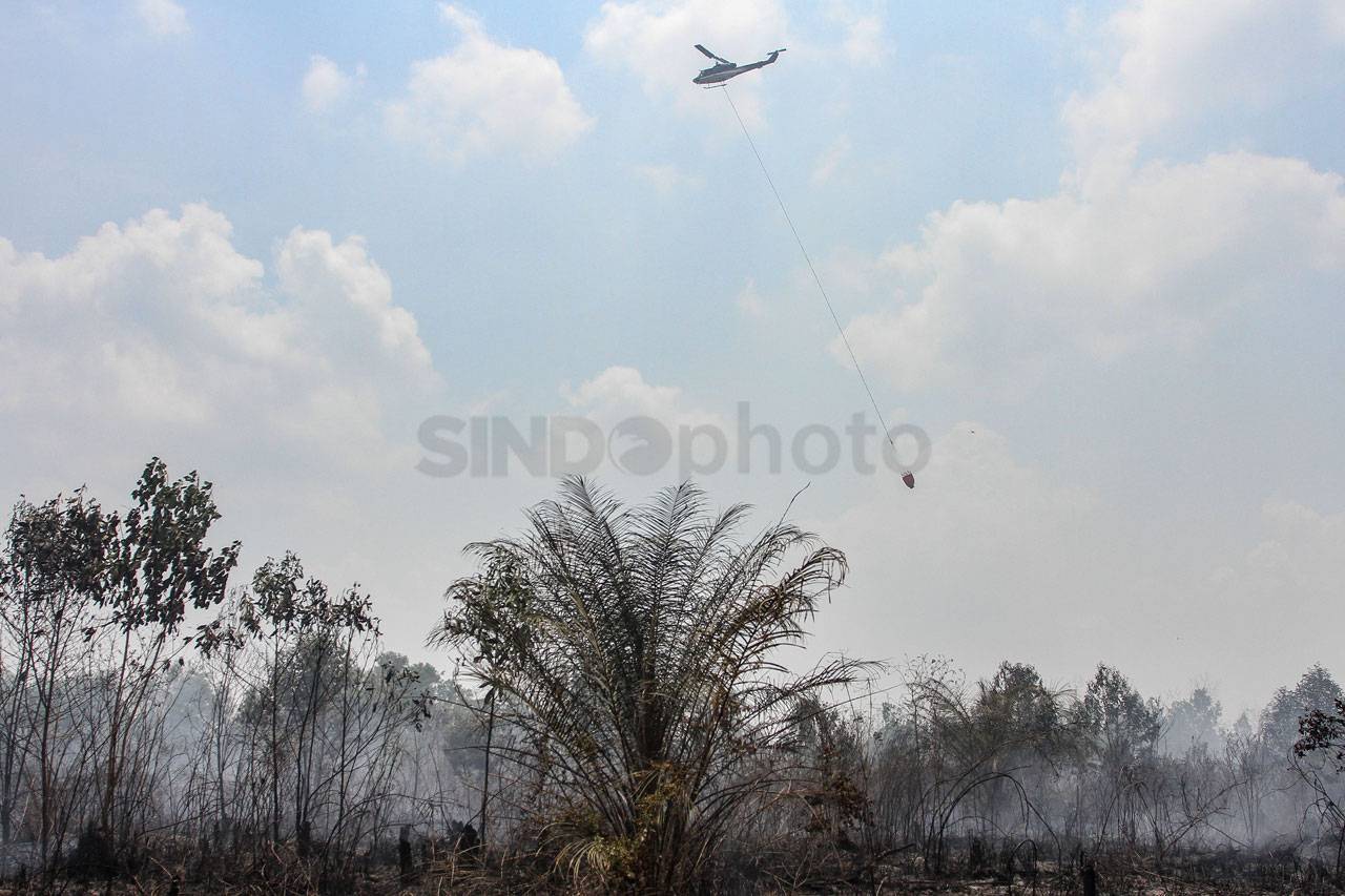 Helikopter BNPB Lakukan...