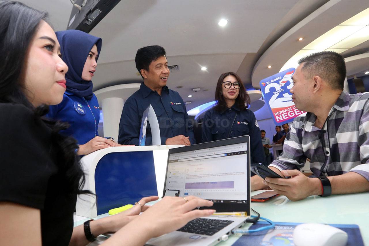 HUT ke-23, XL Axiata...