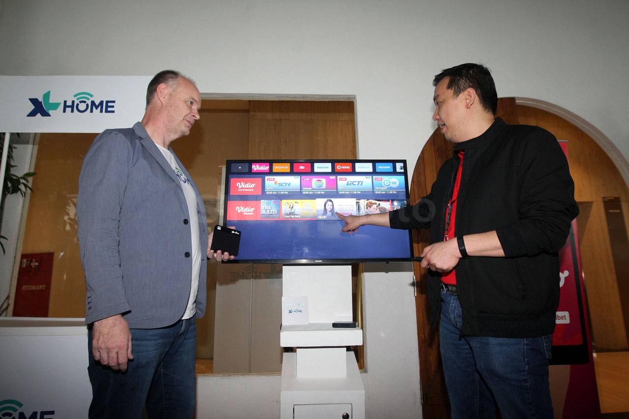 XL Axiata Jalin Kerja...
