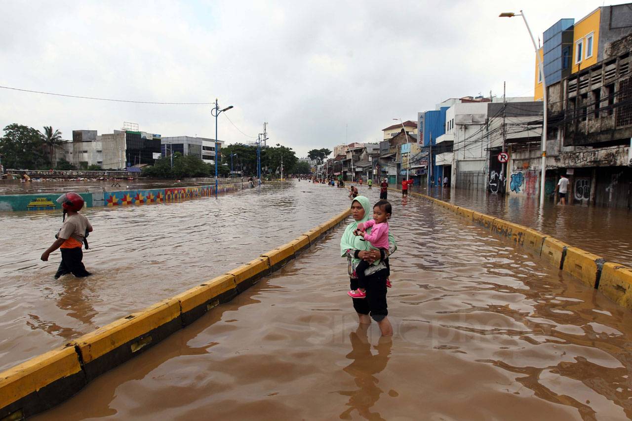 Masih Terendam Banjir,...