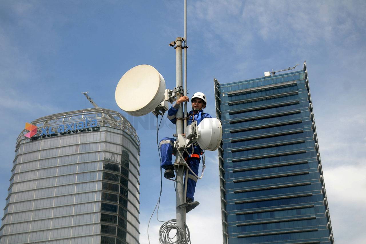 XL Axiata Raih Pendapatan...
