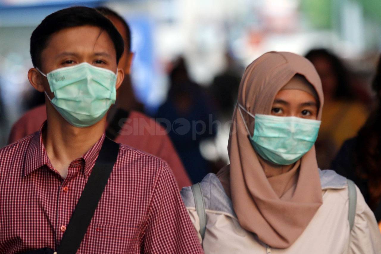Gunakan Masker, Warga...